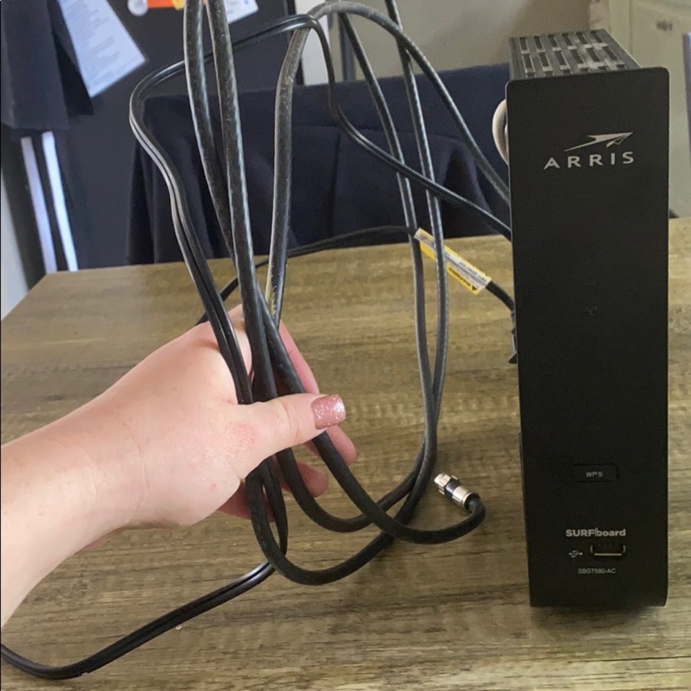 Arris router with coaxial cable model SBG7580-AC